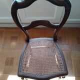 6 mulched solid wood chairs and 2 canework chairs