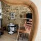 Art nouveau mirror, curved wooden frame and chiseled glass