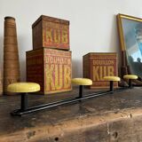 Wall coat rack with 4 vintage yellow metal hooks