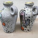Pair of Marius Bessone vases, pitchers