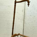Cradle and its spire in beech tinted cherry XX century