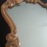 19th century mercury mirror. Wood surround gilded with fine gold.