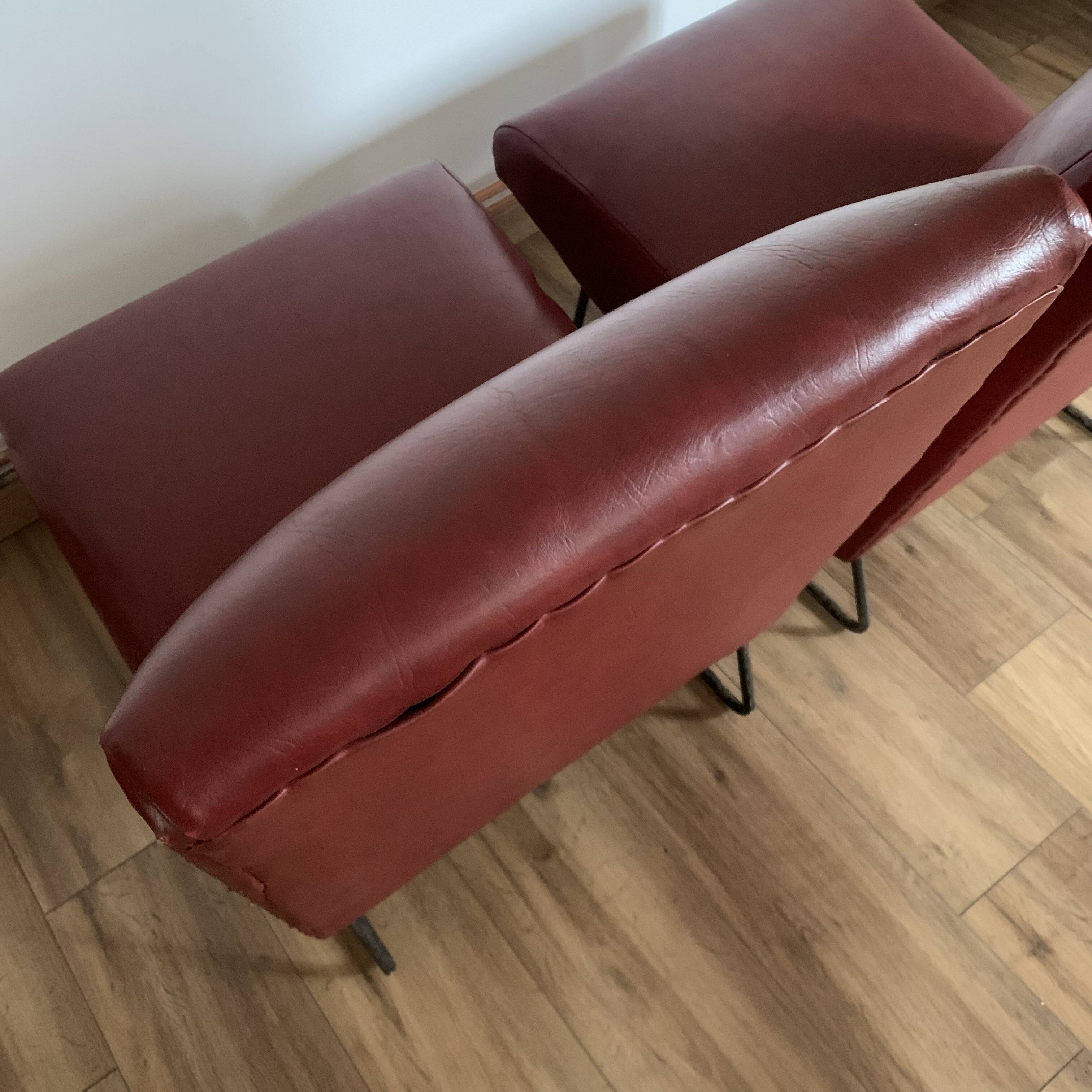 Pair of vintage burgundy red armchairs
