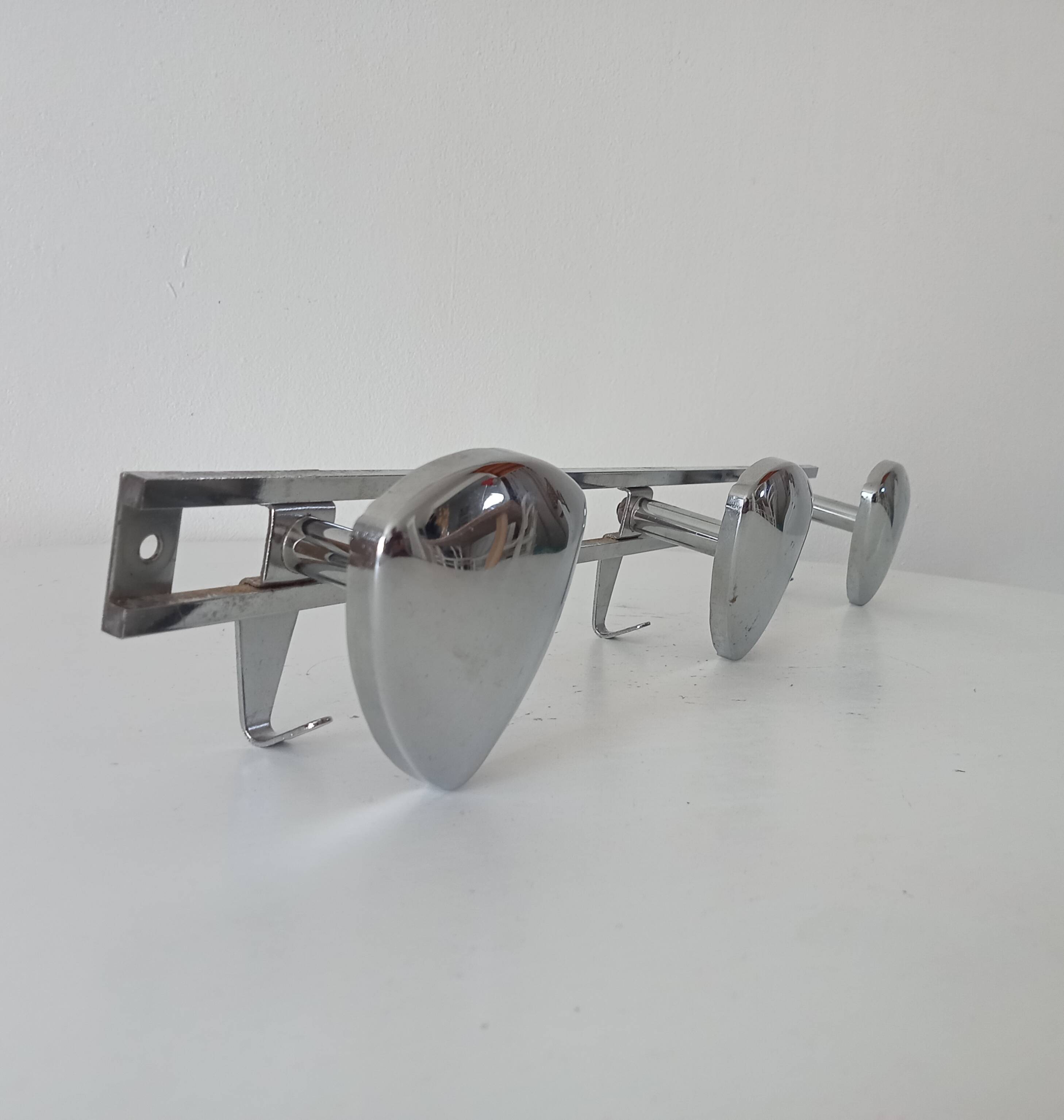 Vintage 1960s chrome wall coat rack automotive design