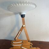 Accordion wood wall light with wavy opaline