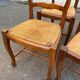 4 Louis XV chairs in solid oak with rush seats, shell carvings, 19th century.