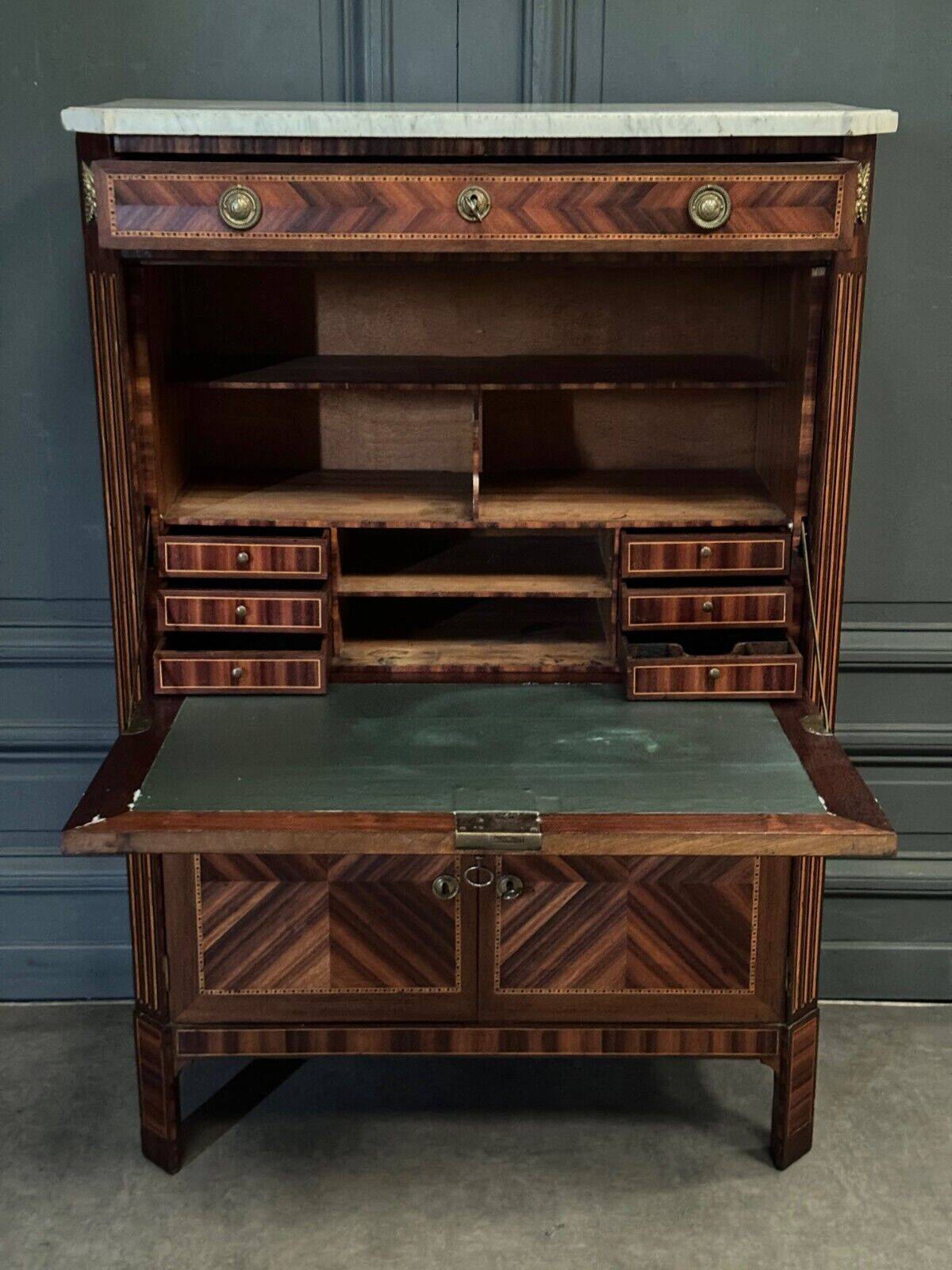Louis XVI period secretary in monogram marquetry and white marble