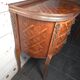 Small curved chest of drawers in Louis XV style with marquetry.