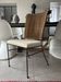 Chairs made of iron and woven rope.