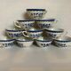 10 old earthenware cups with blue flowers and stencils