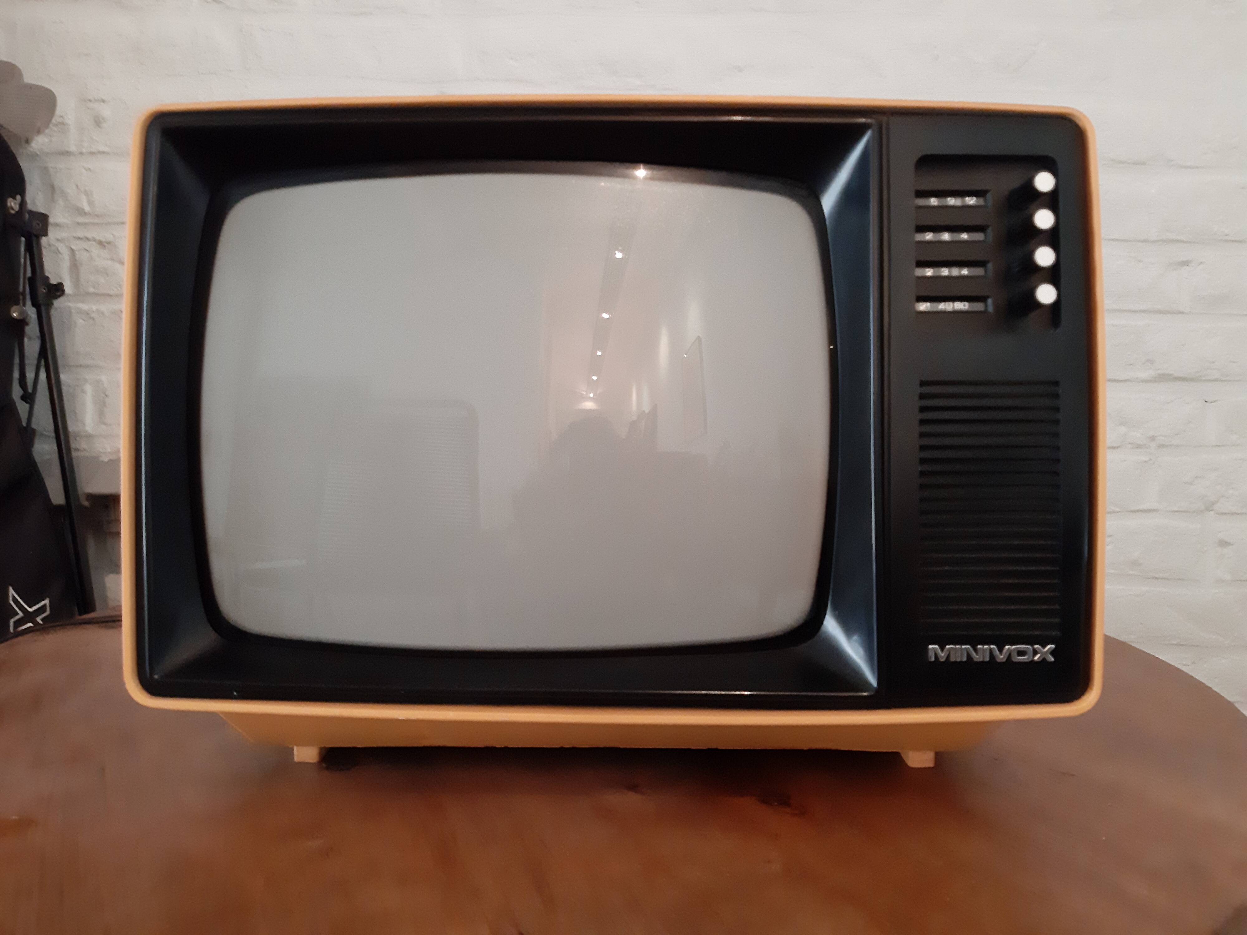 Yellow minivox vintage tv