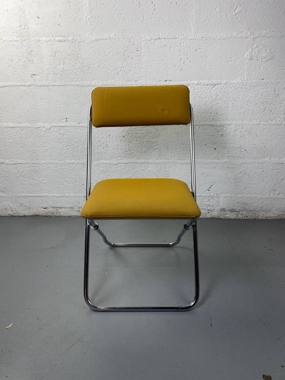 Mustard yellow folding chair