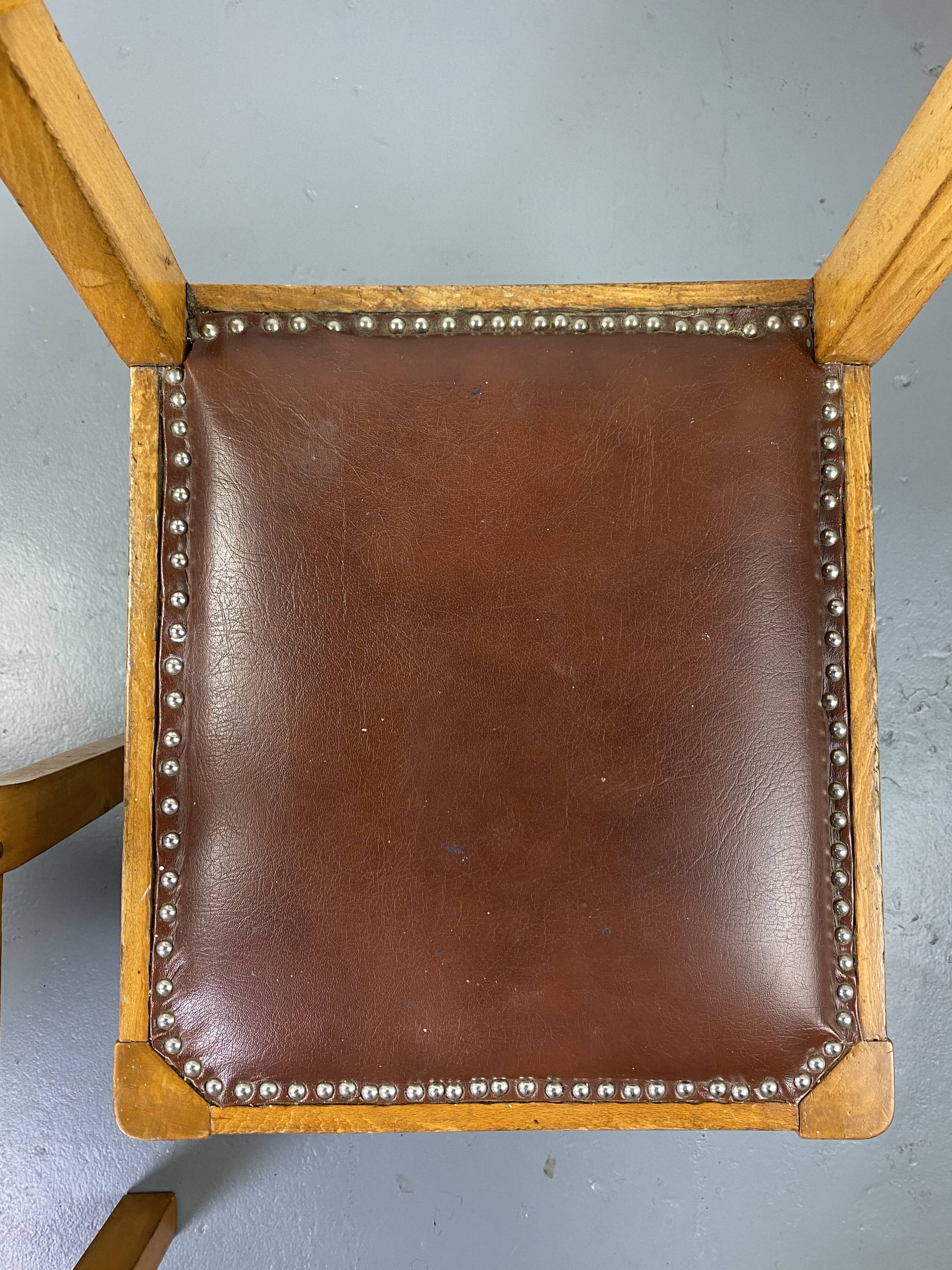 Pair of wooden and leather chairs
