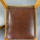 Pair of wooden and leather chairs