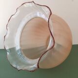 Globe with transparent peach colored glass rims