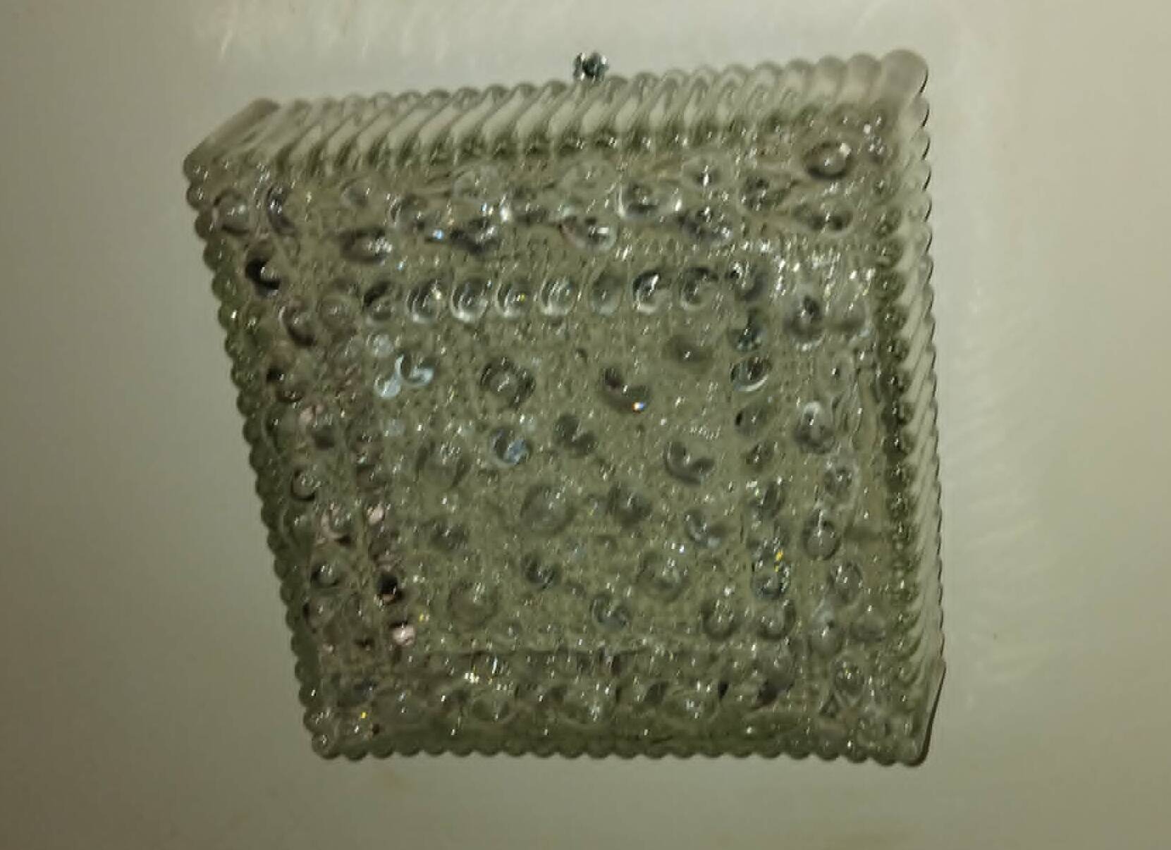 Square ceiling light made of moulded glass from the 1970s.