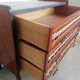 Teak and rattan chest of drawers feet compass