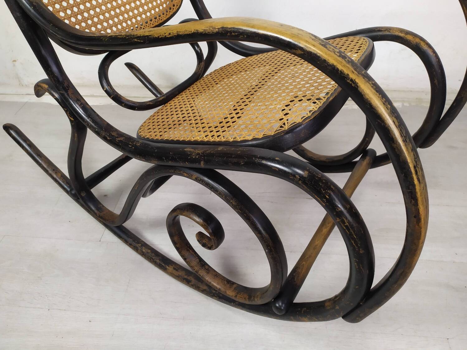 Black curved wood rocking chair