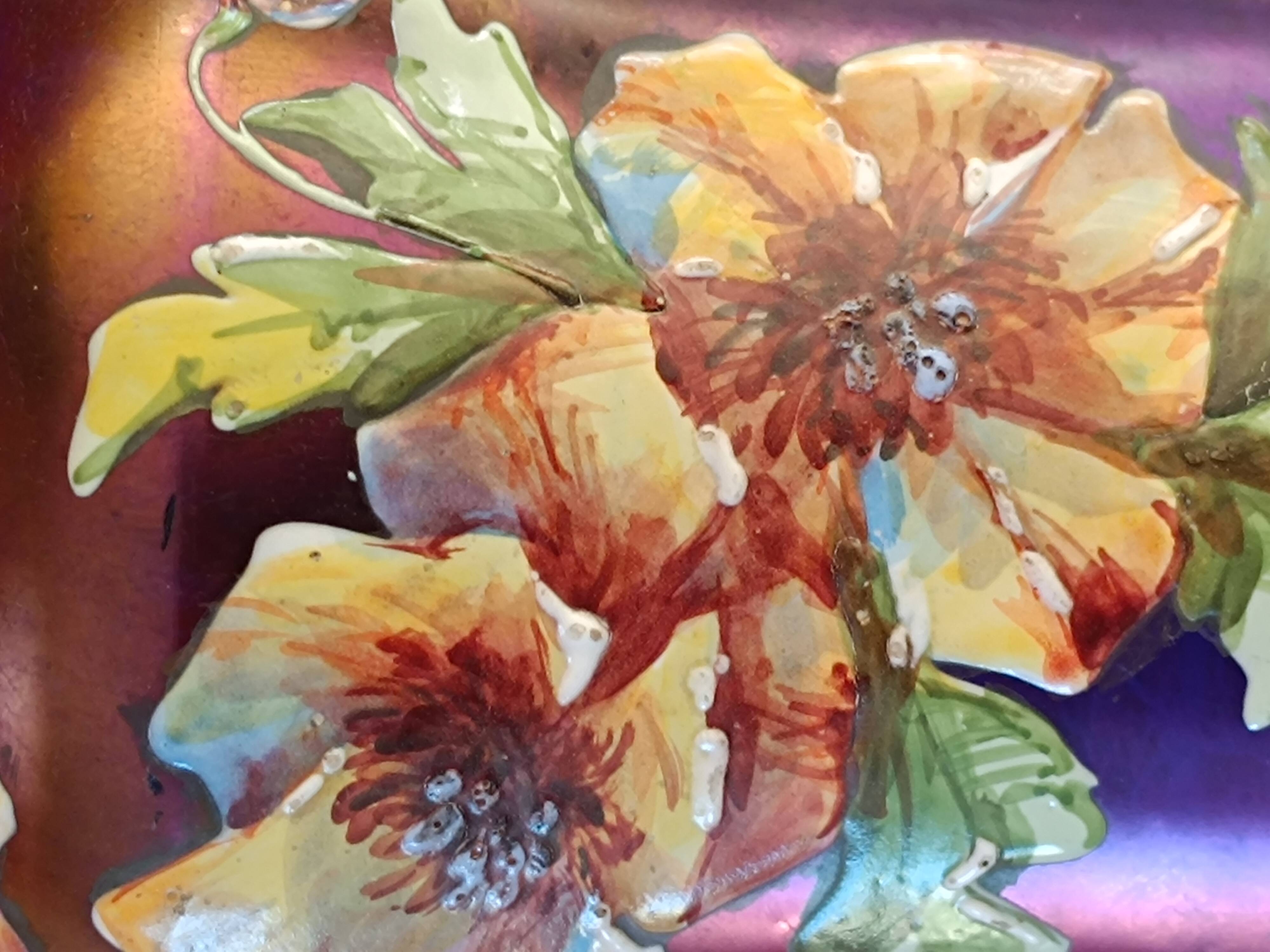 Iridescent glass vase with enamelled flowers, early 20th century