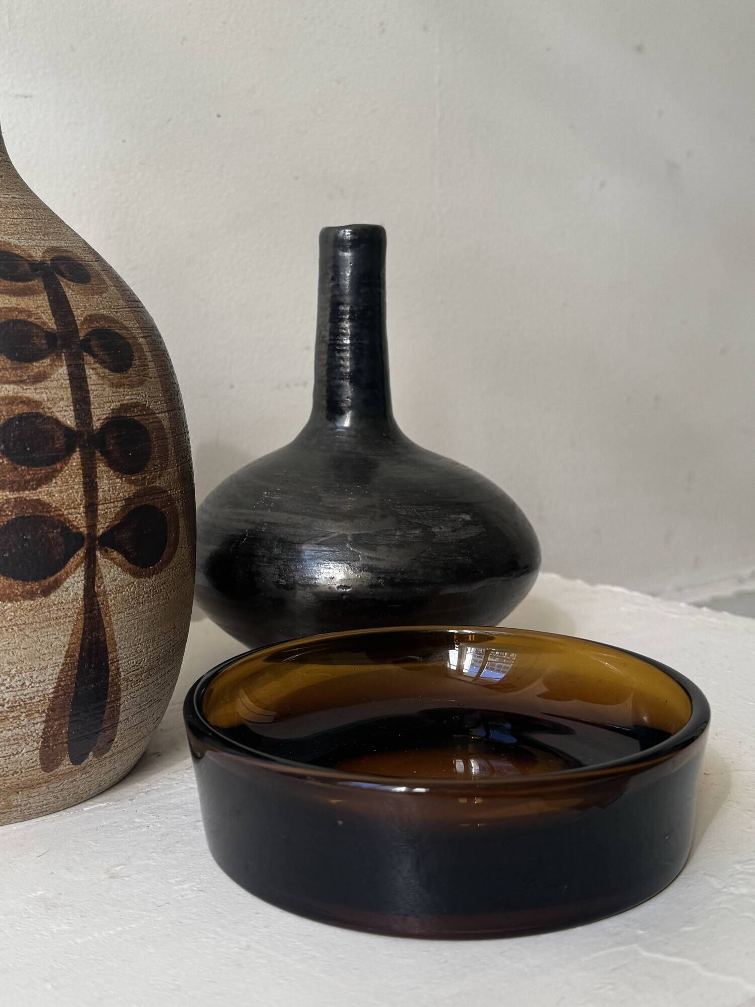 Smoked glass catchall fully tinted in amber.