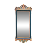 Antique full-length wall mirror in carved wood