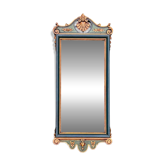 Antique full-length wall mirror in carved wood