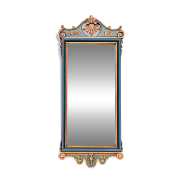 Antique full-length wall mirror in carved wood