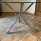 Tripod table Roche Bobois. 1970. Chrome and smoked glass.