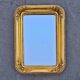 Large Biedermeier gilded mirror in faceted wood, circa 1840.