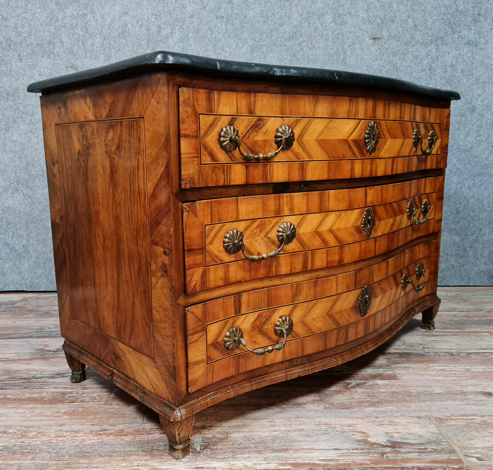 Curved chest of drawers Louis XV period in precious wood marquetry around 1750