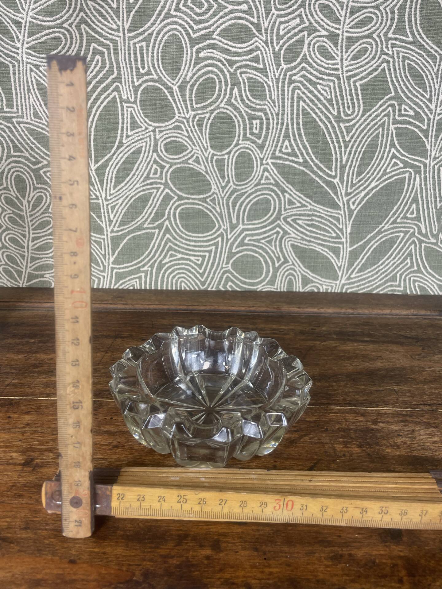 Vintage glass ashtray with star decoration