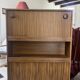 Vintage foldable bedside table in zebra wood – 1970s