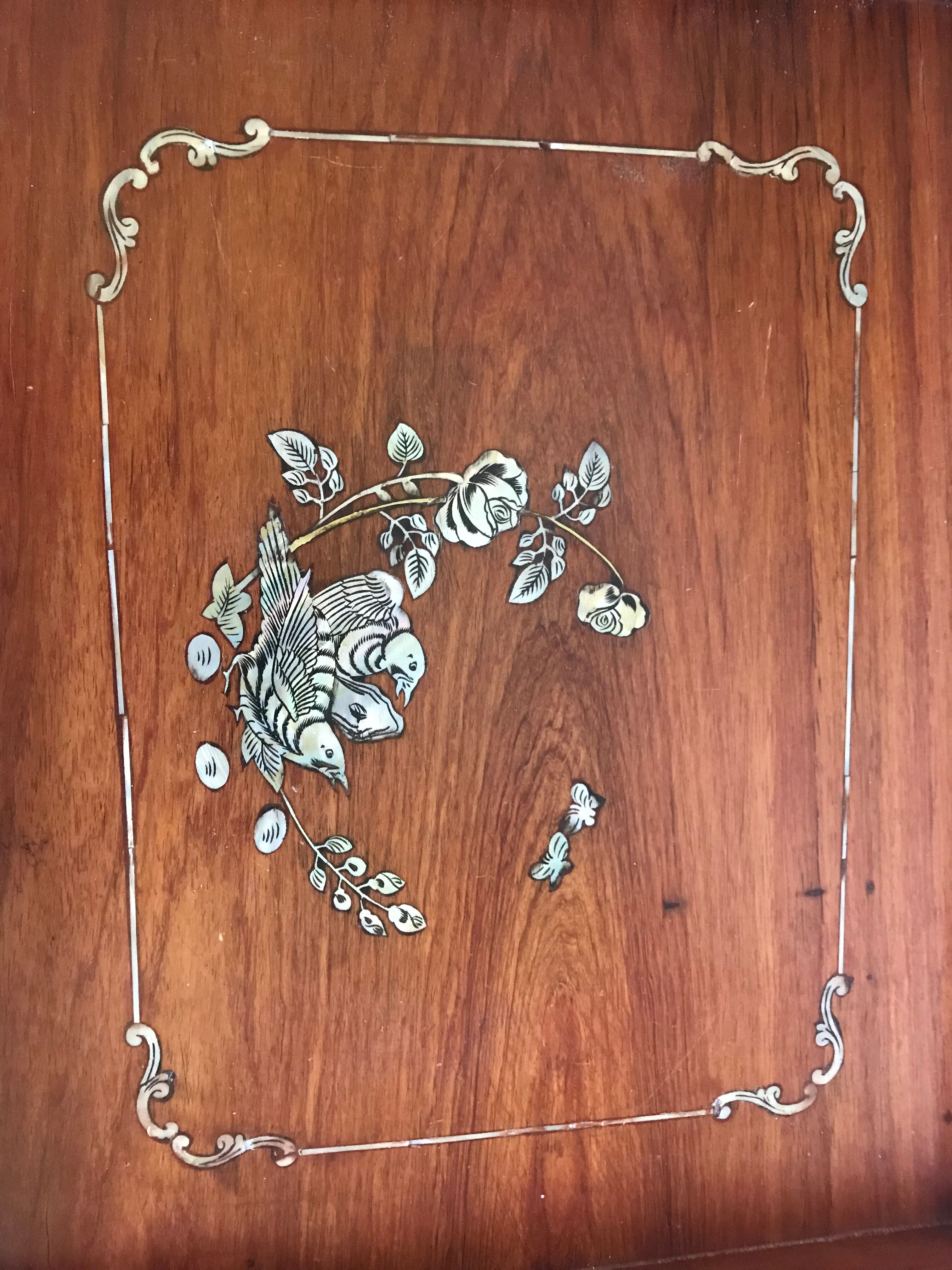 Wood and mother-of-pearl top