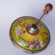 Old lithographed spinning top dating from the 1930