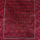 Vintage handmade Baluch rug with geometric pattern from the 1950s.