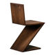Gerrit Rietveld Zig Zag Chair is dark brown stained wood