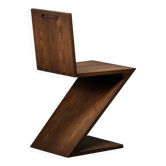Gerrit Rietveld Zig Zag Chair is dark brown stained wood