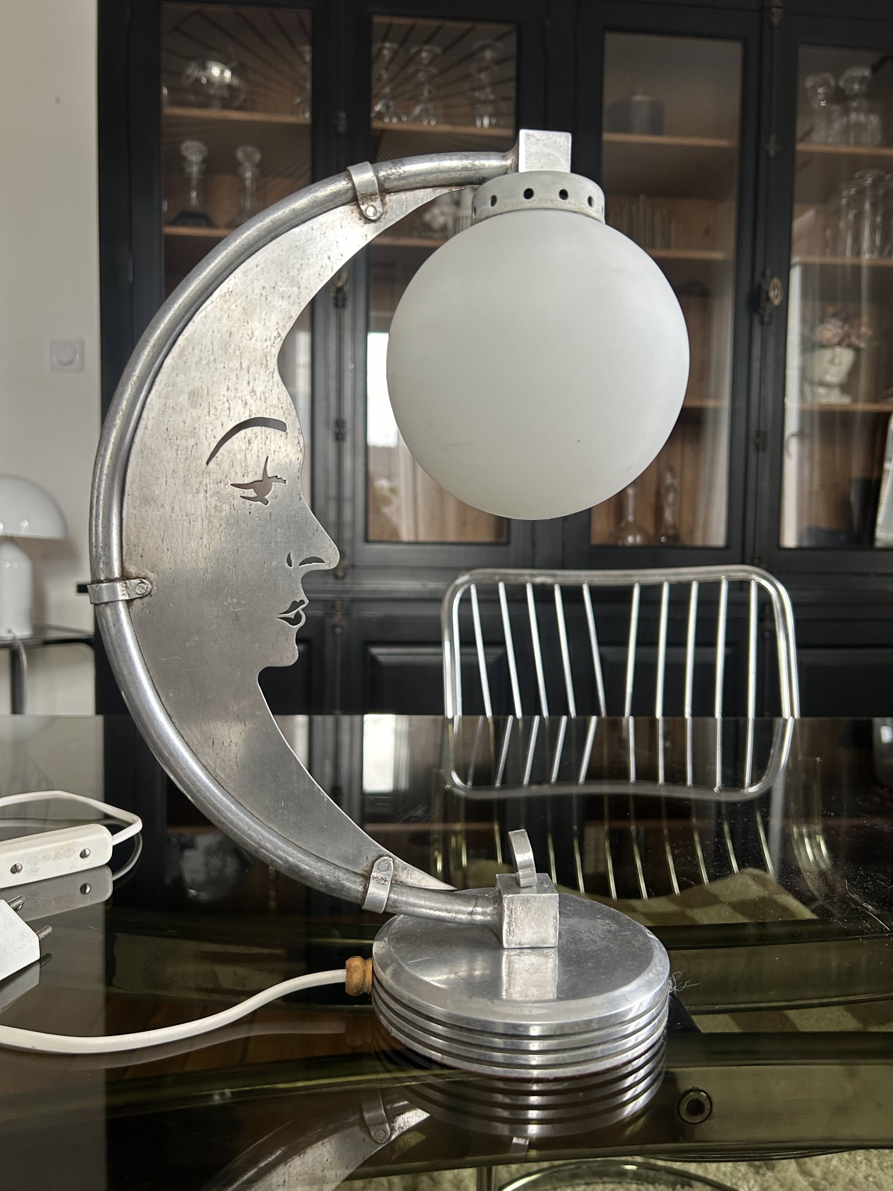 Moon lamp with face in aluminum and white opaline circa 1930