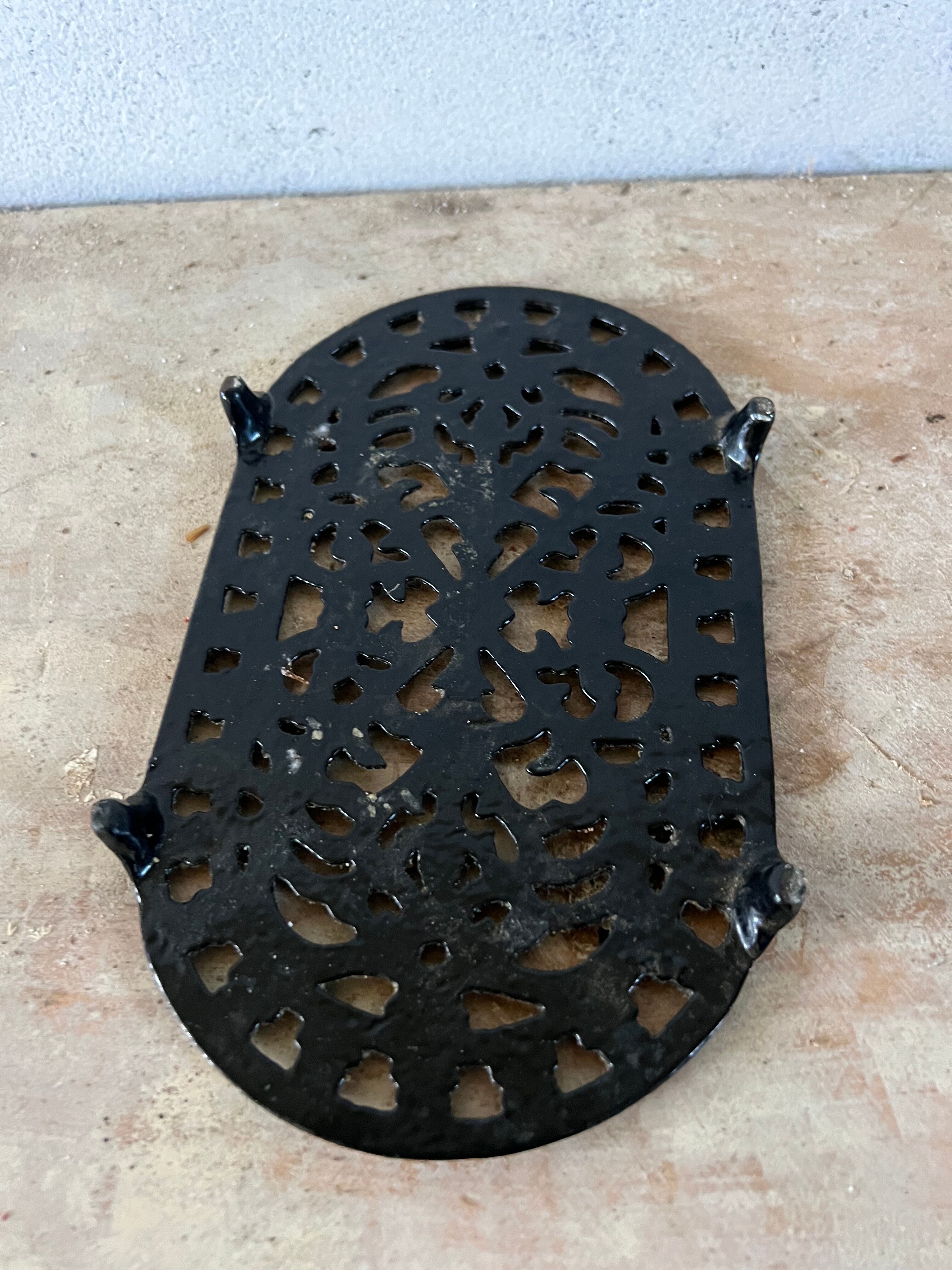 Black cast iron trivets