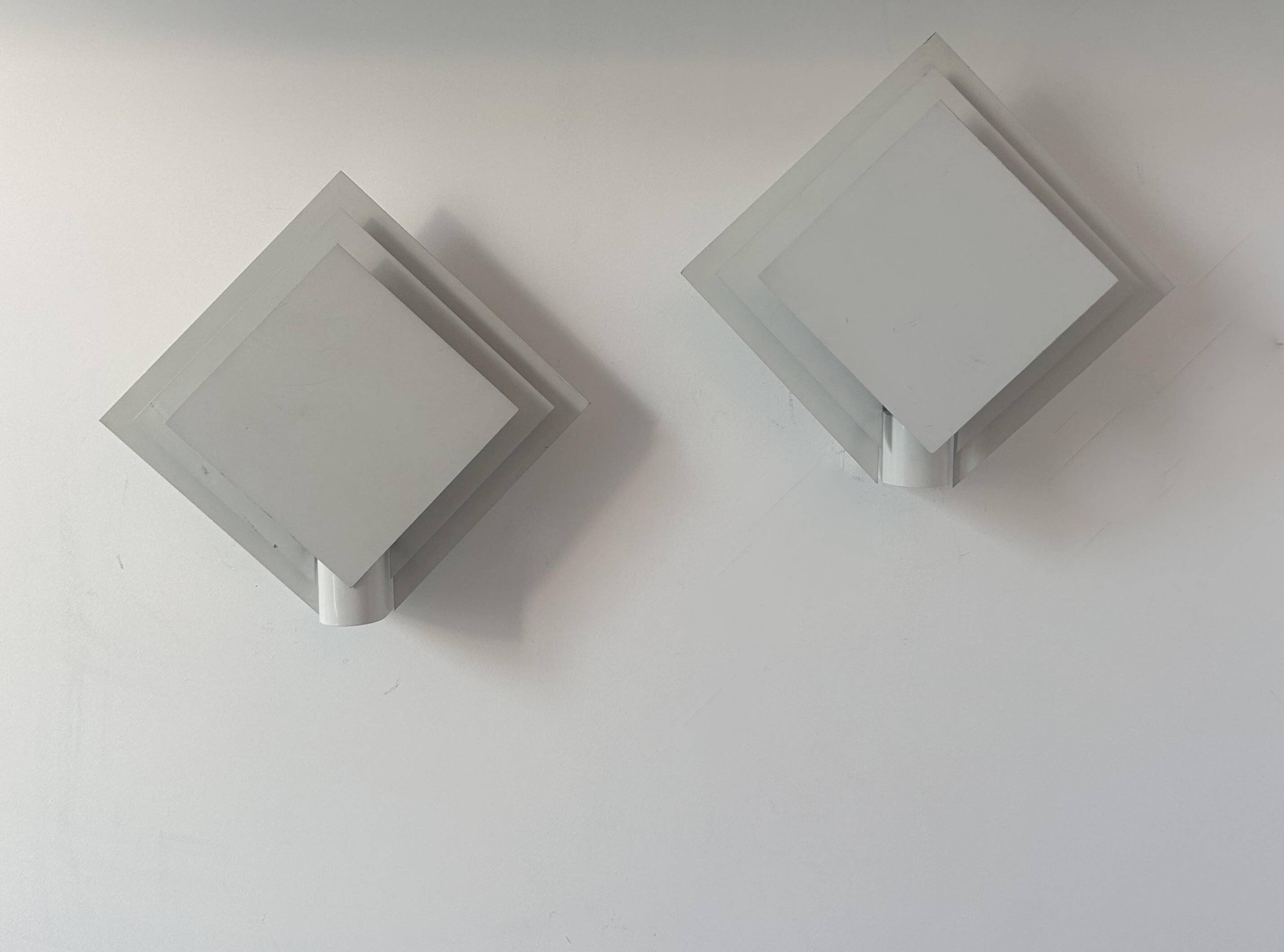 Pair of vintage wall lights, white lacquered metal, Netherlands 1970s