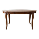 Table de salle à manger ronde extensible style Régence en merisier