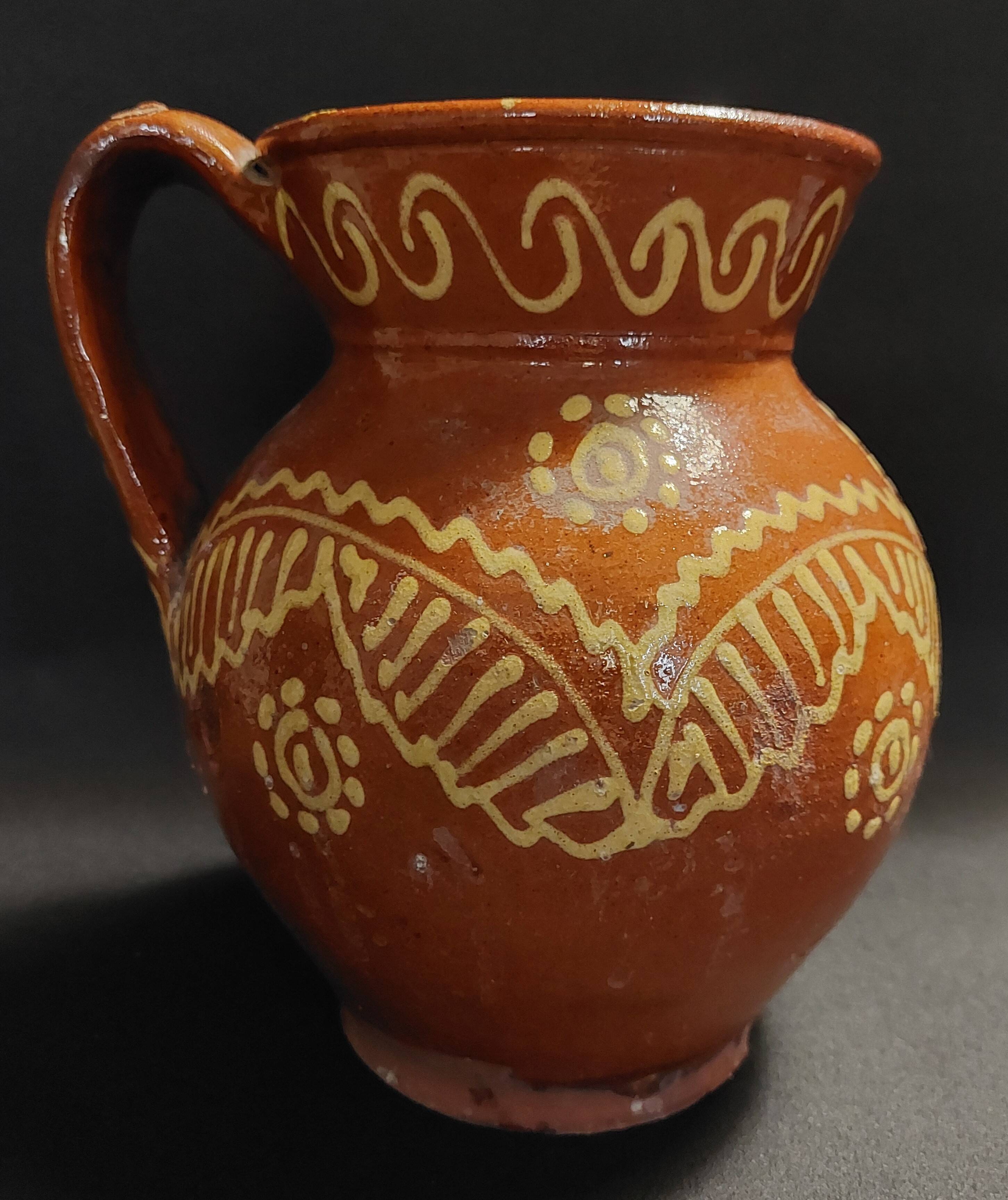 Varnished terracotta jug from Portugal, early 20th century.