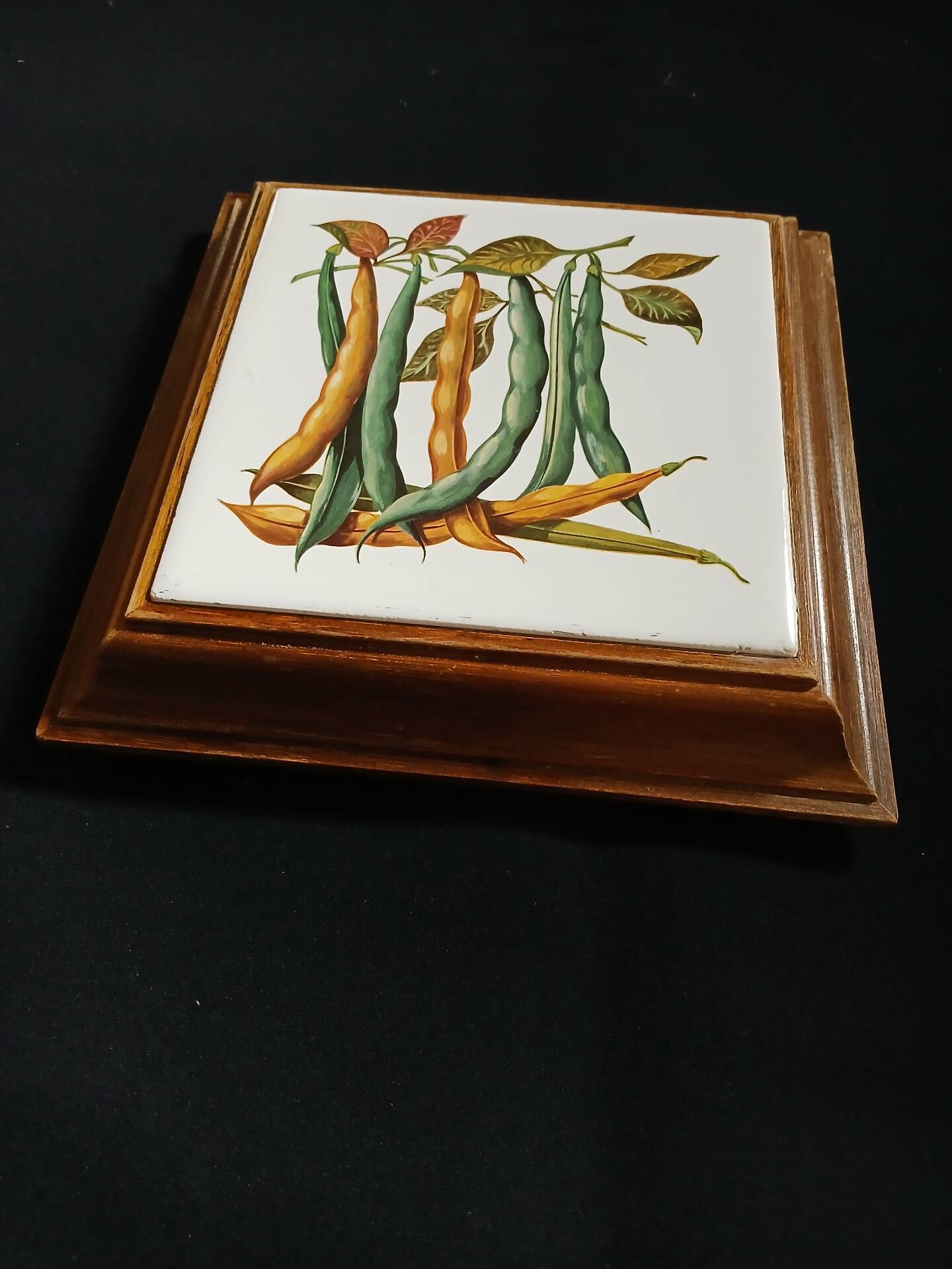 Dessous de plat ancien avec motif botanique