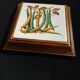 Dessous de plat ancien avec motif botanique