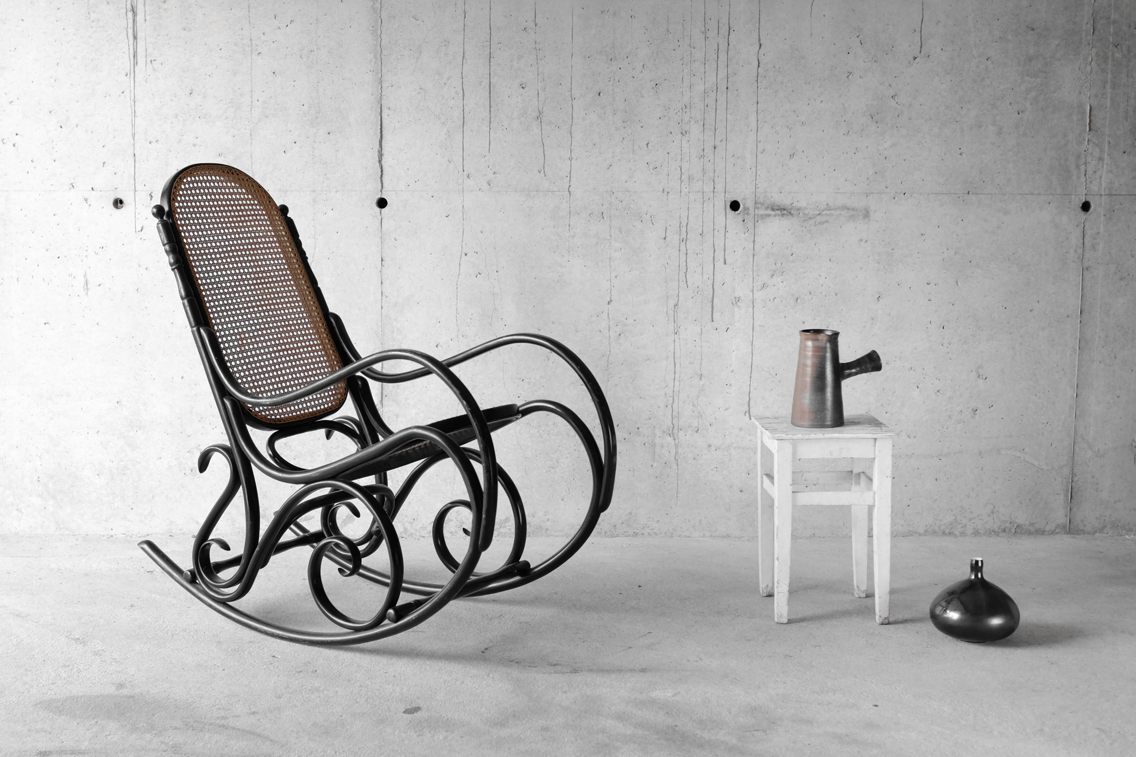 Black rocking chair in curved wood, years 50