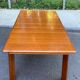 Scandinavian extendable dining table in honey-stained wood for 12 people 1990