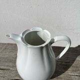 Plain white porcelain teapot