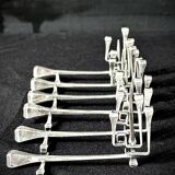Six Brutalist Knife Holders