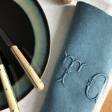 Set of four old damasked and monogrammed towels, tinted multiple colors