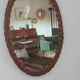 Antique rattan mirror